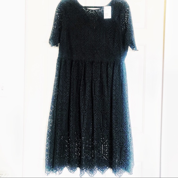 Midi dress with lace overlay.